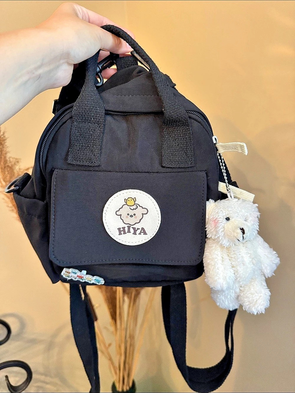 HIYA Black Mini Backpack with Plush Charm